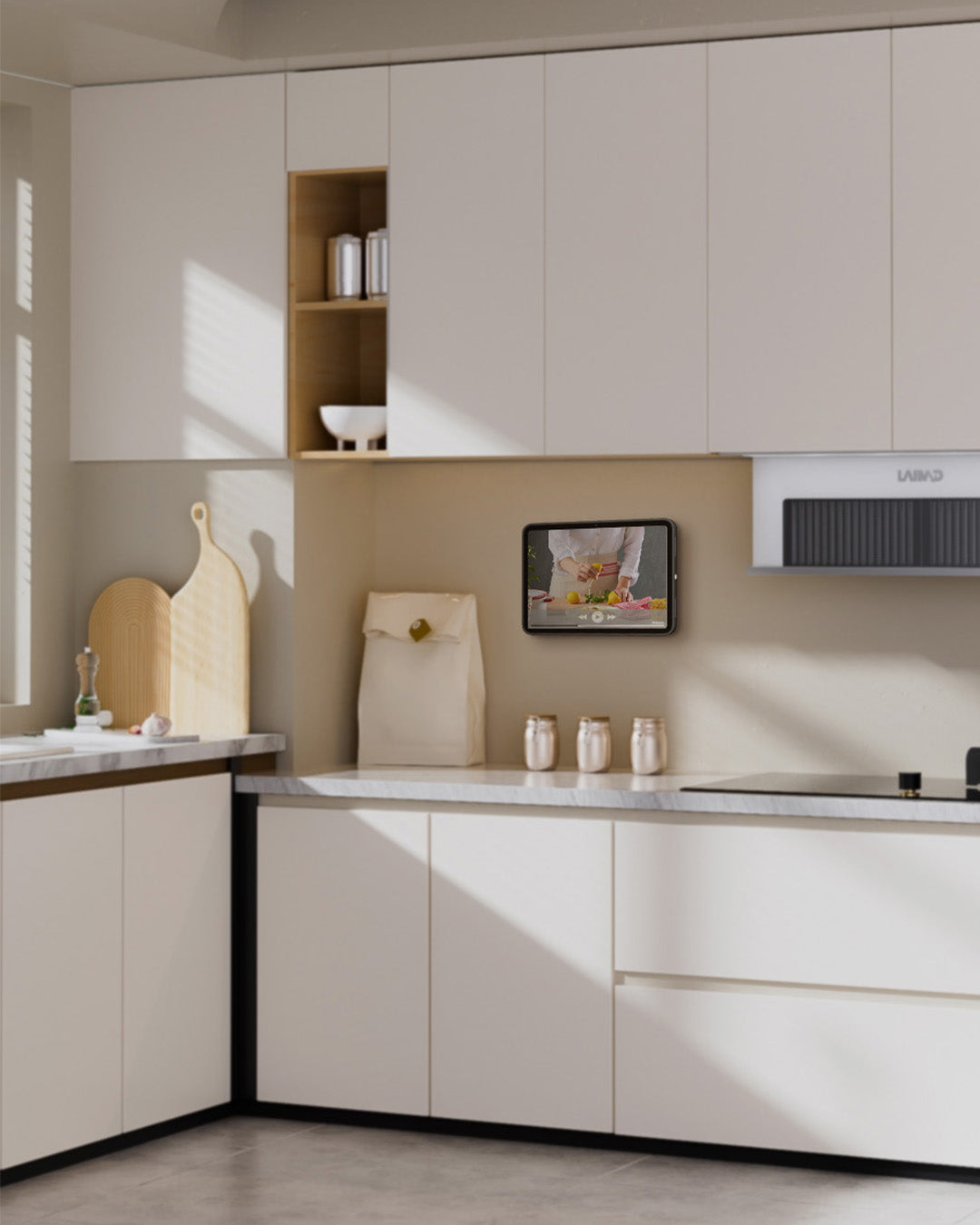 Wall mount charging station in a family kitchen with iPad in use